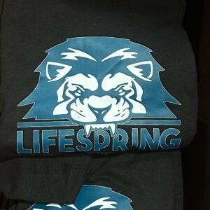 Black tees screen printed with a two-tone LifeSpring lion logo
